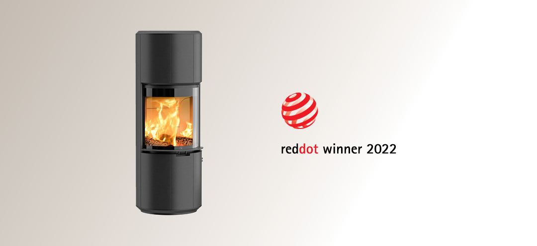 Black fireplace Scan 87 and log Red Dot Award Winner 2022 located on a graded background in warm gray color