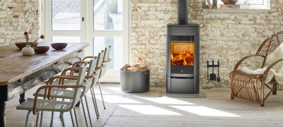 Scan 65-1 in Scandinavian interior in front of a light brick wall