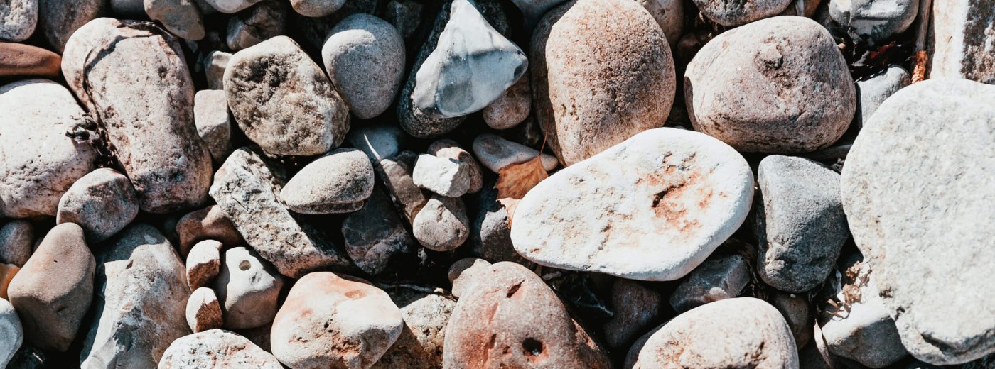 Pebbles in different colors on a beach